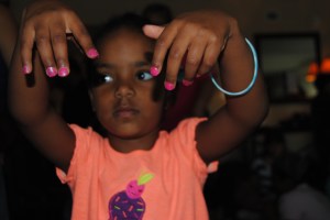 The older girls were painting nails. Naomi loves having painted nails, although you can't really tell that from the picture.