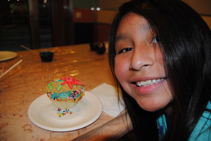 Lili and her cupcake creation.